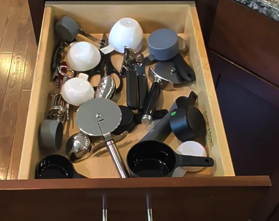 Kitchen utensil drawer before adding an organizer